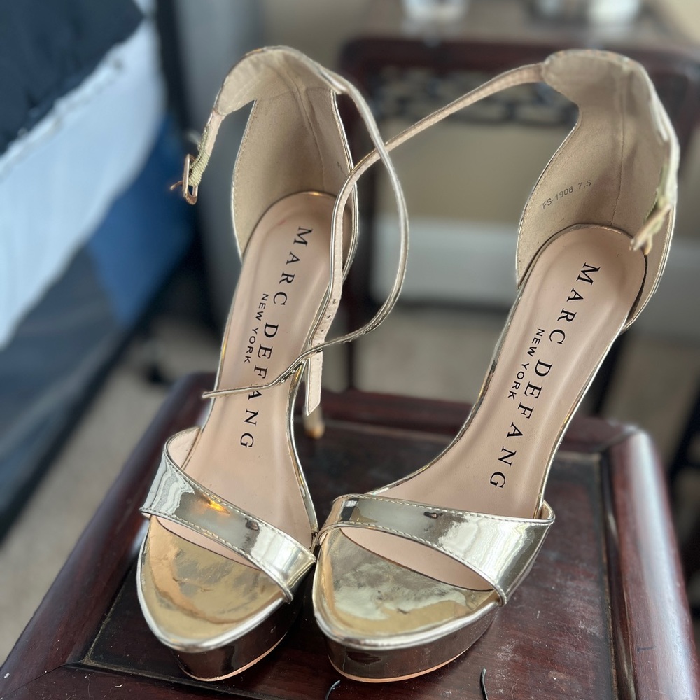 Gold Marc defang heels